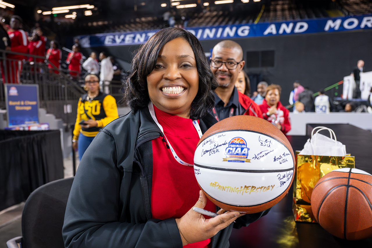 Chancellor Brown Holding Basketball