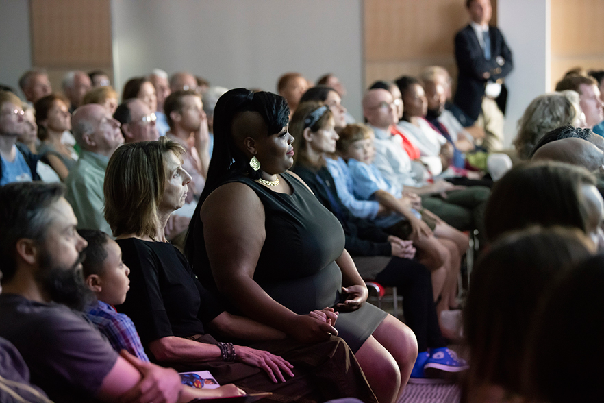 Audience watches documentary