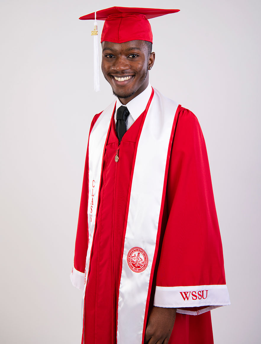 Student wears new red cap and gown