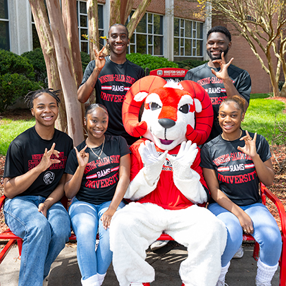 Students hanging out with Amon the Ram