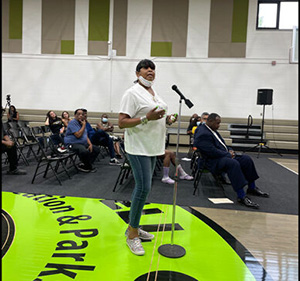 Velma Terry speaking at an anti-gun violence training meeting in August.