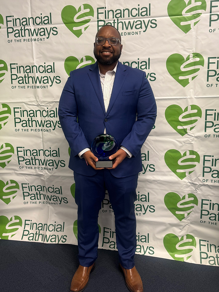 Dr. Martin with an award