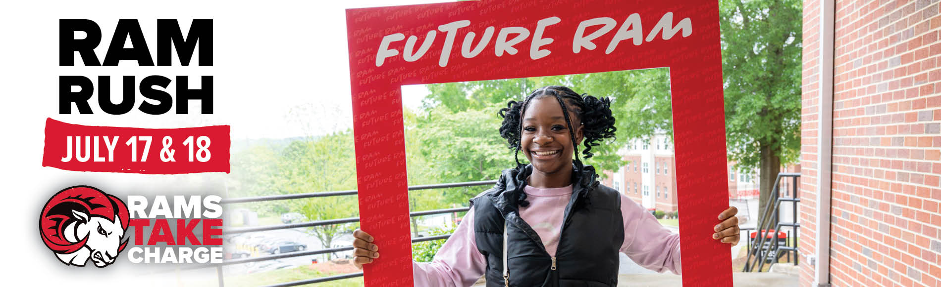 Student holding selfie frame